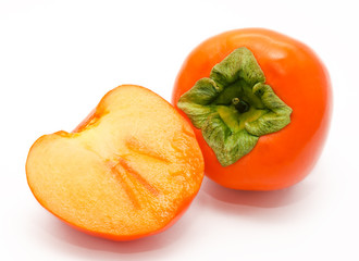 Orange ripe persimmon isolated on white