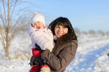 Fototapeta premium Mother and Daughter in Winter