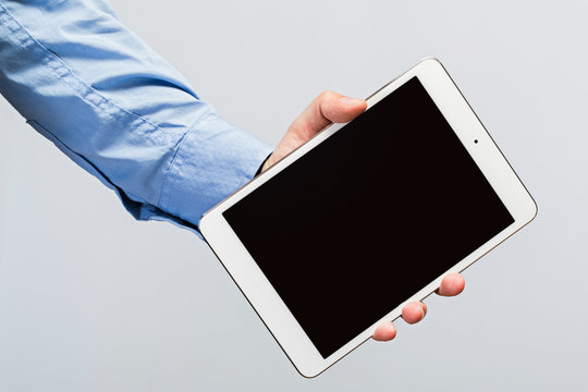 White tablet pc in hands