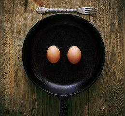 smiling eggs in pan