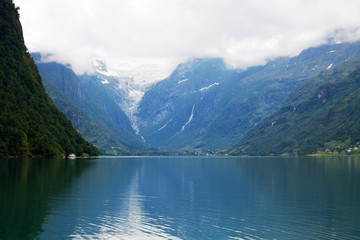 Naklejka na ściany i meble A typical Norwegian landscape with a lake