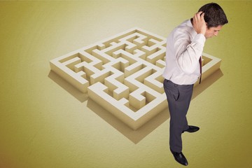 Composite image of thinking businessman scratching head