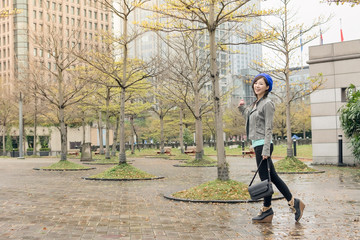 Asian woman walk at street