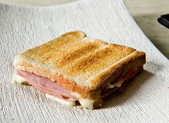 Crisp toasted ham and cheese sandwich