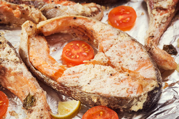 Baked trout steak in cream sauce with vegetables