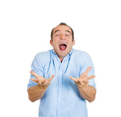 Happy funny young man laughing, excited, joyful