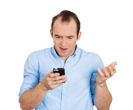 Surprised, unhappy man with phone, receiving bad news