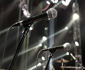 microphone on the stage and empty hall during the rehearsal