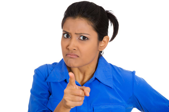 Serious furious woman pointing finger, blaming someone