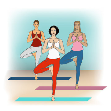 Yoga Studio. Yoga class. Women in yoga poses in yoga class.