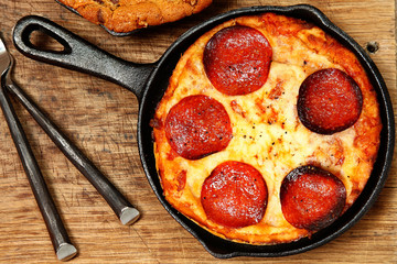 Skillet Peperonni Pizza on Table