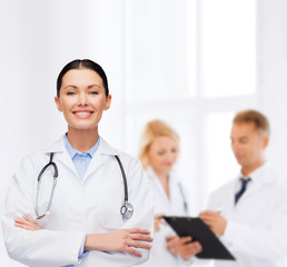 smiling female doctor with stethoscope