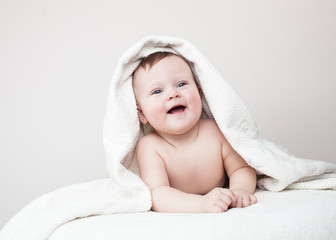 laughing baby on sofa, Beautiful smiling cute baby, newborn - 61330770