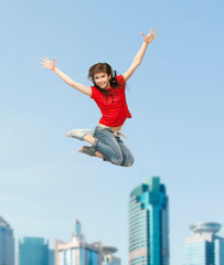 Fototapeta na wymiar smiling girl jumping