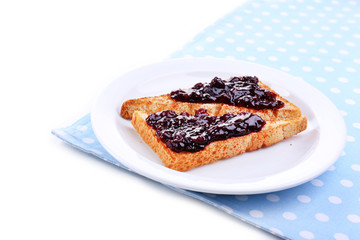 Delicious toast with jam on plate isolated on white