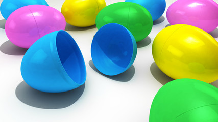 A collection of plastic Easter Eggs over a white background