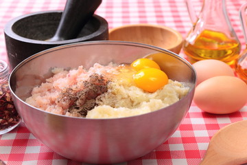 Minced fish in the bowl and spices