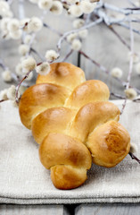 Easter bun on wooden table