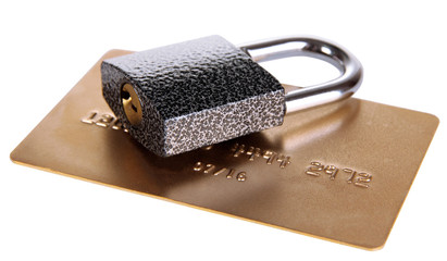 Credit card and lock isolated on white