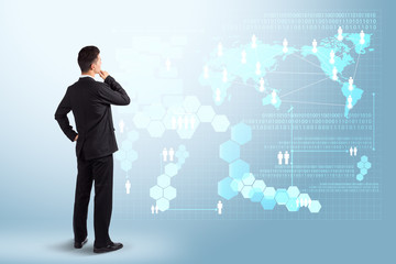 Businessman looking to the future information technology digital