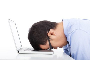 young businessman too overwork to asleep