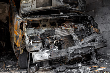 Fototapeta na wymiar Close up photo of a burned out cars