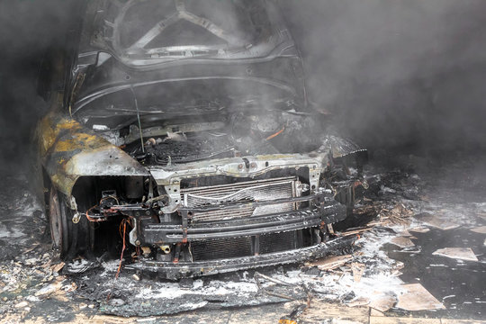Close up photo of a burned out cars