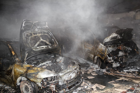 Close up photo of a burned out cars