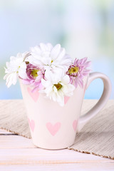 Beautiful chrysanthemum flowers in cup