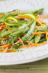 Asparagus salad with carrot and hemp seeds