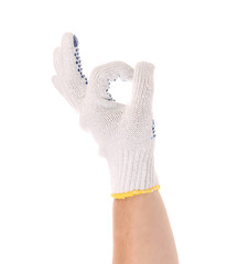Hand shows ok sign in glove.