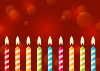 Birthday candles on red background