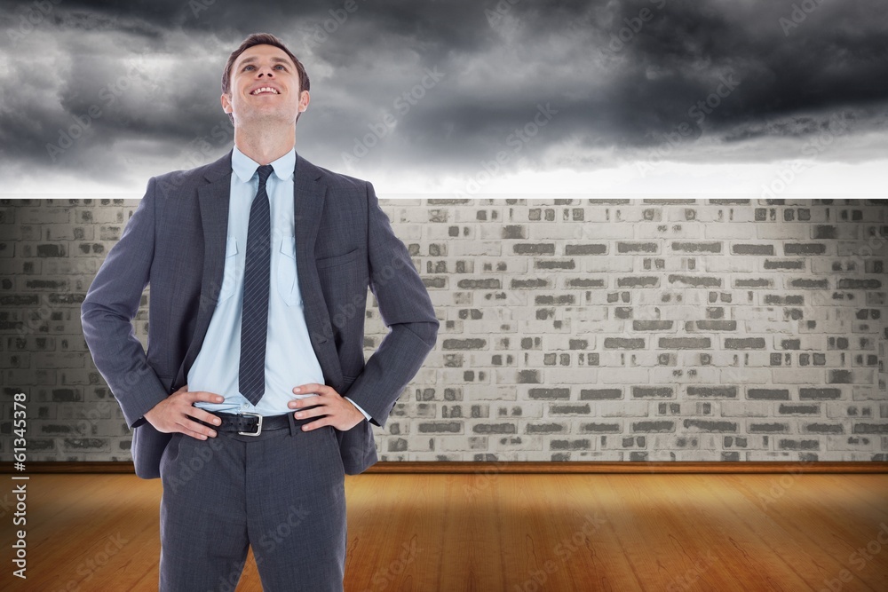Poster composite image of smiling businessman with hands on hips