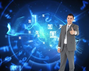 Composite image of businessman thumb up