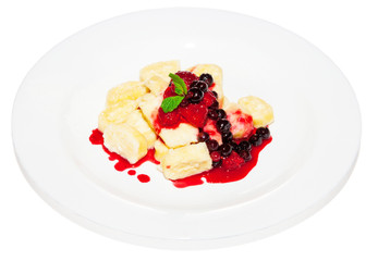 Pudding curd with fruit and syrup dessert on plate