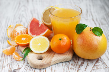 Citrus fruits and fresh orange juice