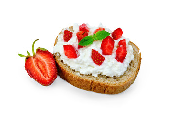 Bread with curd cream and berries of strawberries