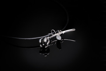 Tin and silver jewel