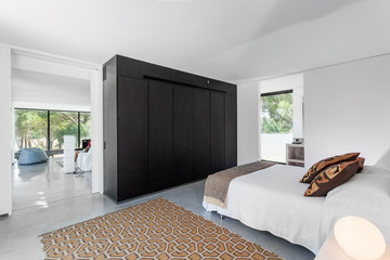 Fototapeta premium Bedroom in modern vacation house