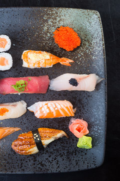 japanese cuisine. sushi set on the background