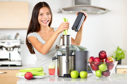 Vegetable juice raw food - healthy juicer woman