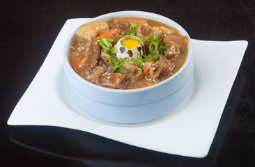 japanese cuisine. beef soup on the background