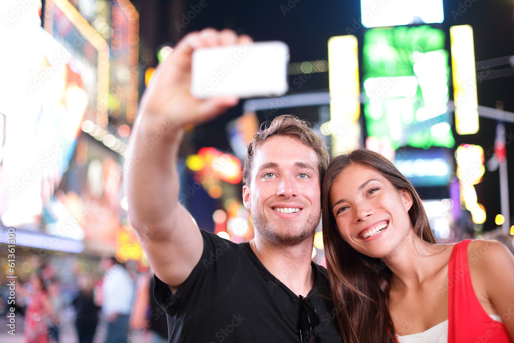 Wall mural dating young couple happy in love taking selfie manhattan, usa.