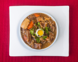 japanese cuisine. beef soup on the background