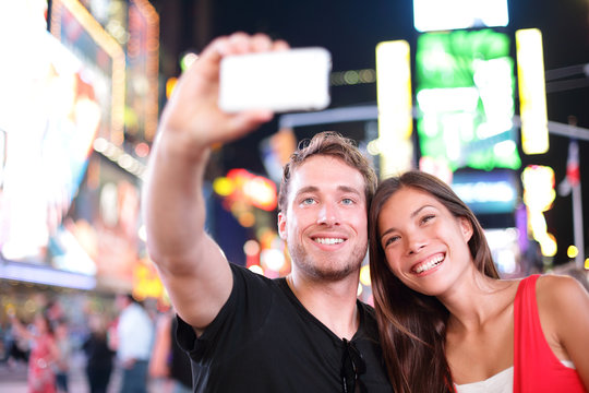 Dating young couple happy in love taking selfie Manhattan, USA.