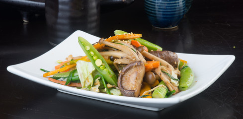 japanese cuisine. fried mix vegetables on the background