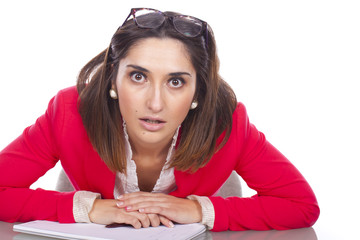 Beautiful young woman bored at work