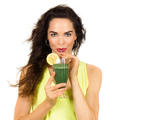 Woman drinking a green smoothie.