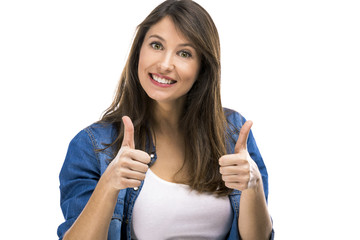 Beautiful woman with thumbs up, isolated over white background