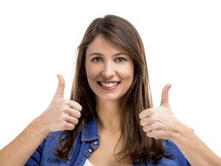 Beautiful woman with thumbs up, isolated over white background